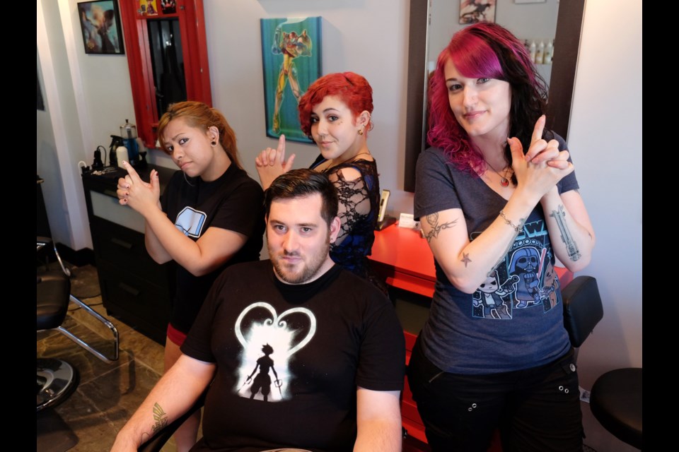 The crew at B-Bombshell Salon in New Westminster strike a pose. Owner is Ryan Paul surrounded by (from left to right) Ashley Reddy, Talisa Correa, and Jen Cleroux. The salon has its grand opening Aug. 9.