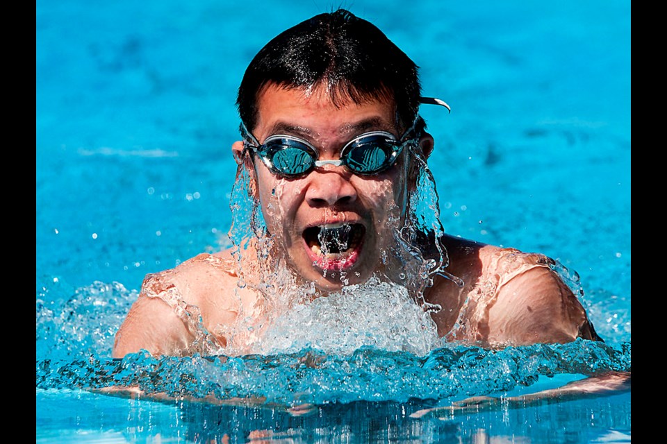 Burnaby Barracudas club swimmer Edward Wong competes in the Division 5 boys' 100-metre butterfly at the Simon Fraser Region swim championships at Central Park Pool last week.