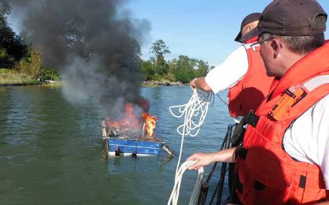A small fishing boat caught fire near Shady Island on Aug.9, 2014. Photo by Steveston Lifeboat Institution