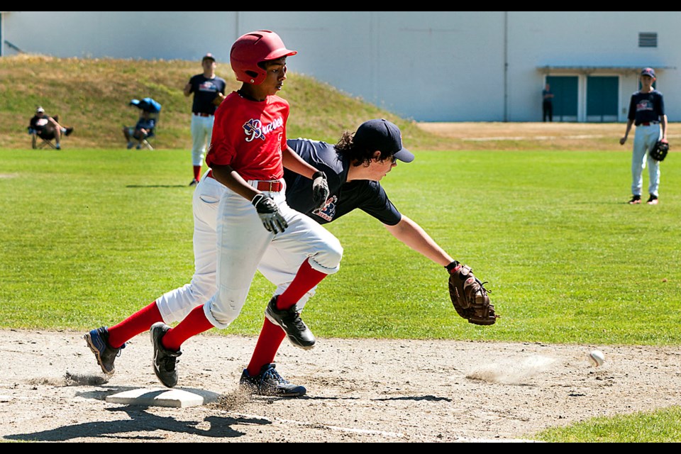 080714 - Burnaby, BC
Chung Chow photo
BC Minor Baseball U-15 "A" Baseball Championships at Kensington Park Diamonds.
BUrnaby Braves (red) vs Kamloops
Braves #2 takes advantage of an error and makes it safe to 1st.