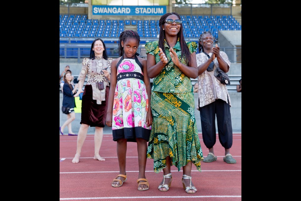 Festival goers watch the show at the fifth annual Africa Musical and Cultural Festival in Burnaby on Saturday, Aug. 9.