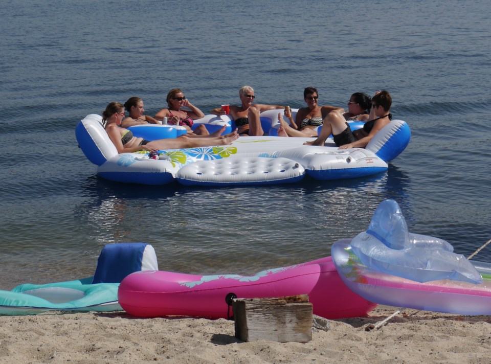 All the girls on the giant floatie.