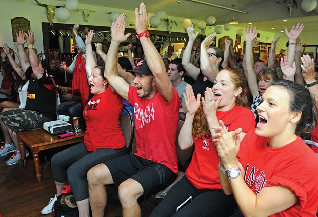 Fans, friends and family — including Jenny and Matt Shaughnessy and Sarah Hussey in the front row — gather at Capilano Rugby Club Sunday morning to share in the highs and lows of Canada’s 21-9 loss to England in the final of the Women’s Rugby World Cup. Club members Andrea Burk, Hilary Leith and Mandy Marchak all started for Canada.