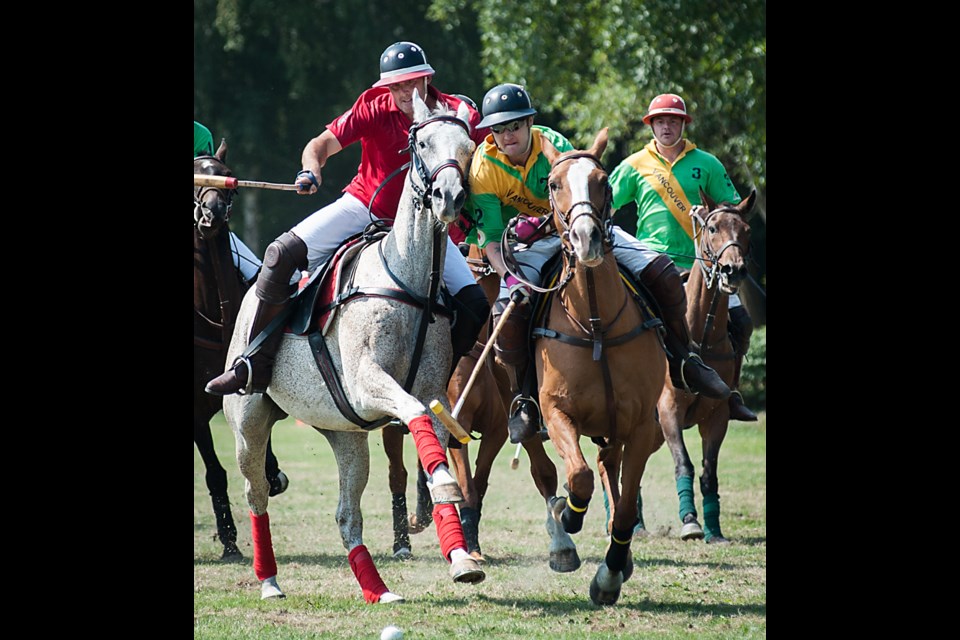 A Backyard Vineyards player attempted to ride-off his Polo Ralph Lauren Fragrance opposition during Sunday’s consolation final of The Southlands Cup. The Backyard Vineyards (in green) took the 7-6 win. The horses, traditionally called ponies, have cut manes so the hair can’t interfere with play. Photograph by: Rebecca Blissett