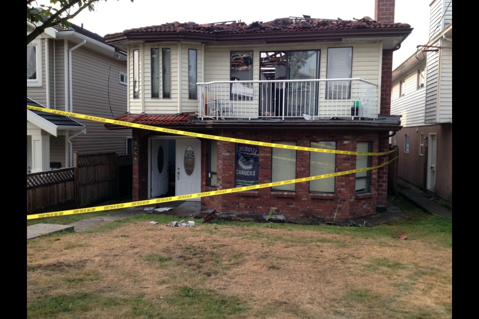 A family of four and a basement tenant are without a home after a two-alarm blaze ripped through a residence on Neville Street between MacPherson and Plum avenues early Friday morning.