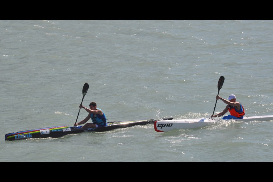 Top two racers Sean Rice and Clint Robinson battle it out for top spot near the finish line