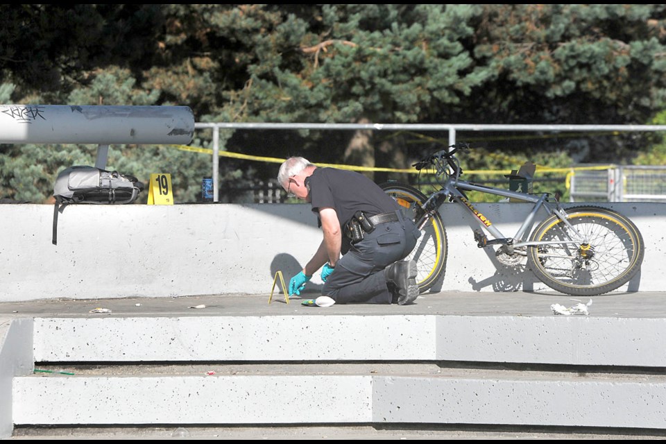 Mounties were at Bonsor Park Wednesday morning to process the scene of a double stabbing the night before.