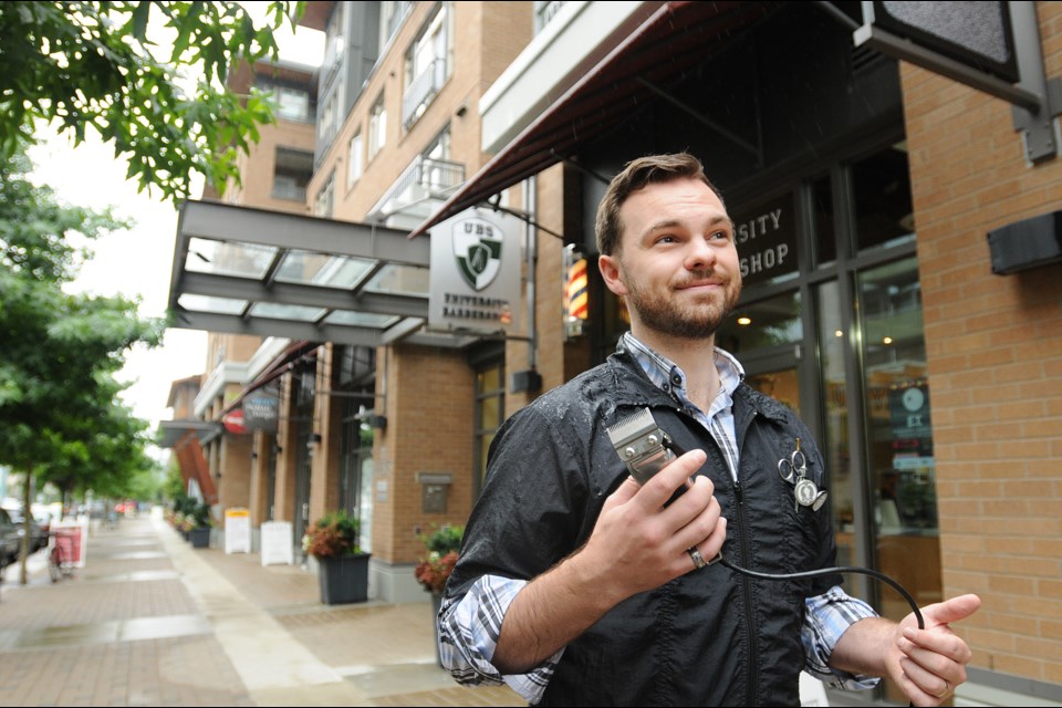 Brennan Cuff opened the University Barbershop in Wesbrook Village in February 2013. He used to live near the university and saw the community's potential for growth. Photo Dan Toulgoet