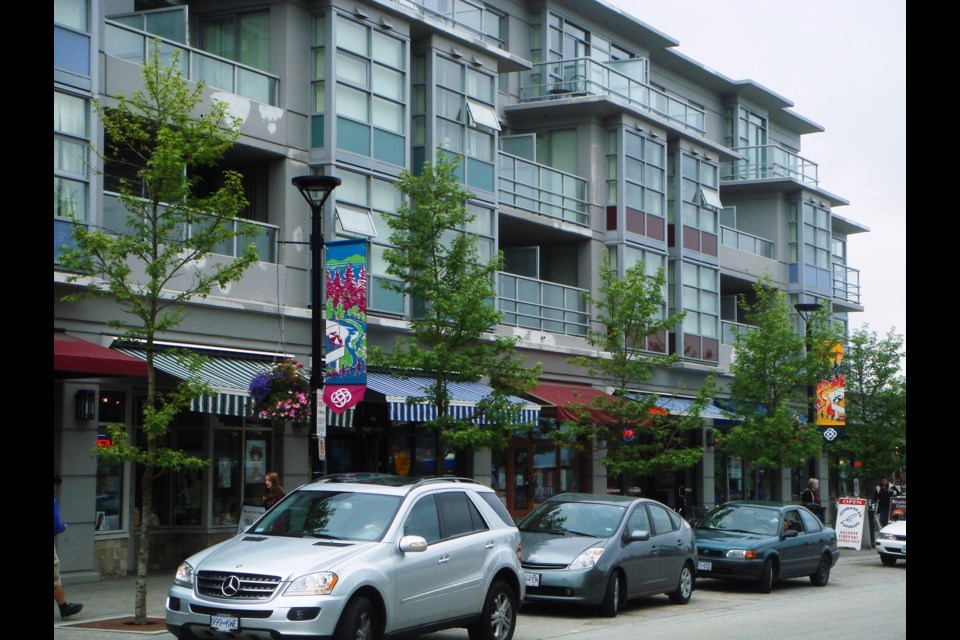 At SFU's UniverCity the university did away with expensive parking meters and replaced them with wall mounted ticket dispensers