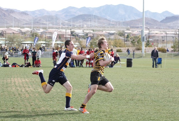Capilano Rugby Club's Jack Parr pulls away from a tackler during a recent sevens tournament. Capilano will host its first North Shore Sevens tournament Sept. 13-14, an event they're hoping will grow to become the biggest youth sevens tournament in Canada.