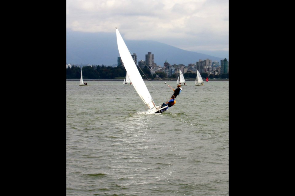 Mait Davis, skipper, and Henry Wing, crew, on a Laser 2.