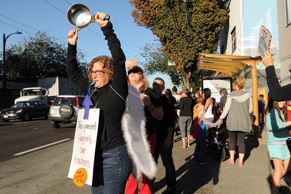 Parents, students and teachers took part in a march this morning (Sept. 12) along Hastings Street in support of striking teachers.