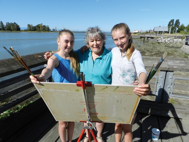 Lynn Spence, centre, along with her granddaughters Allison (left) and Klara, will be among the 100 or so painters taking on the challenge of the Grand Prix of Art Sept. 20 in Steveston.