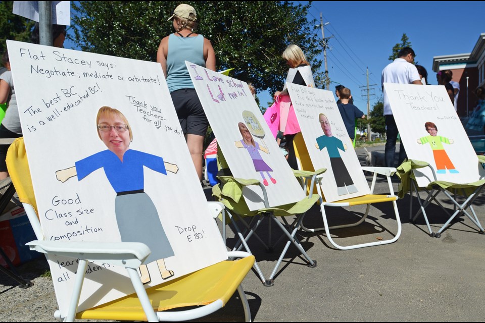 A Gilmore Community Elementary School family shows support for teachers and education despite not being able to attend a Friday parent "sit-out" at the school in person.