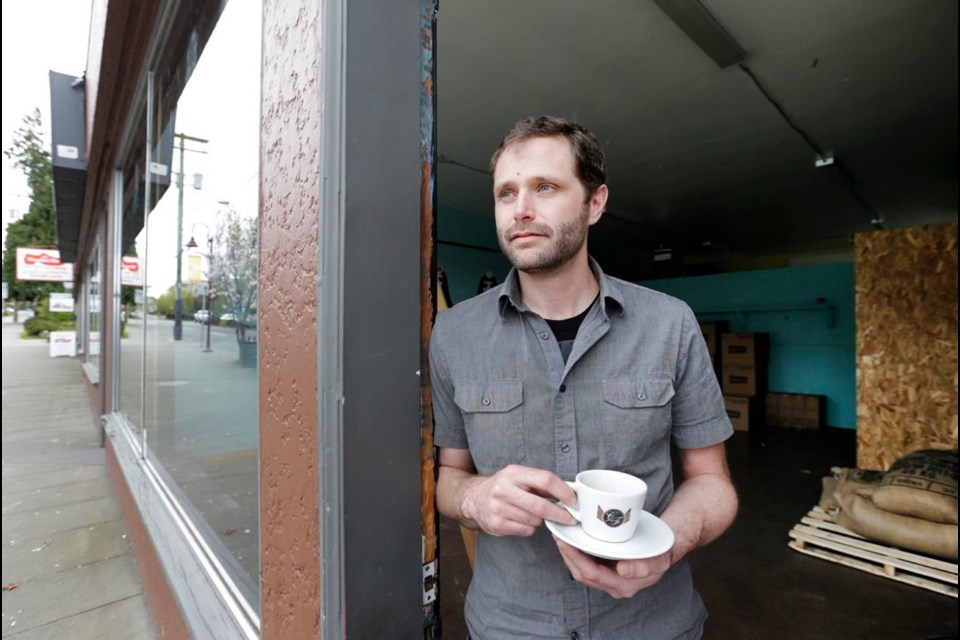 Ryan Taylor in the former bookstore that will be used to expand Caffe Fantastico.