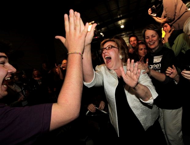 Green Party of Canada leader, Elizabeth May, celebrates with supporters after winning a seat in parliament for Saanich Golf Islands in Victoria, B.C. May  2, 2011