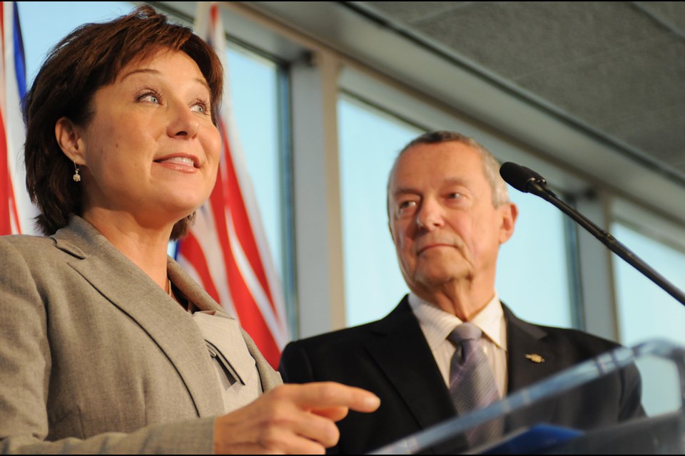 Premier Christy Clark and Education Minister Peter Fassbender speak about the tentative agreement between the government and teachers, reached Sept. 16. Photo: Dan Toulgoet