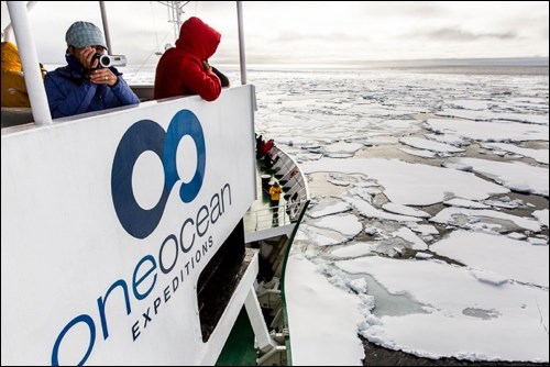 The ship belonging to One Ocean Expeditions, a small ߣbased adventure tour company, breaks through the ice in the Arctic. The company played a significant role in the recovery of the two vessels lost in the Franklin Expedition over 150 years ago.