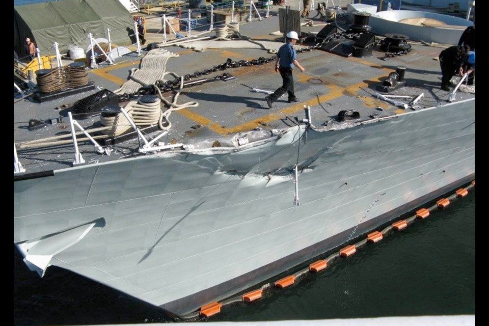 Damage to port side of HMCS Winnipeg caused by American Seafood vessel American Dynasty, which collided with the warship in Esquimalt Harbour.