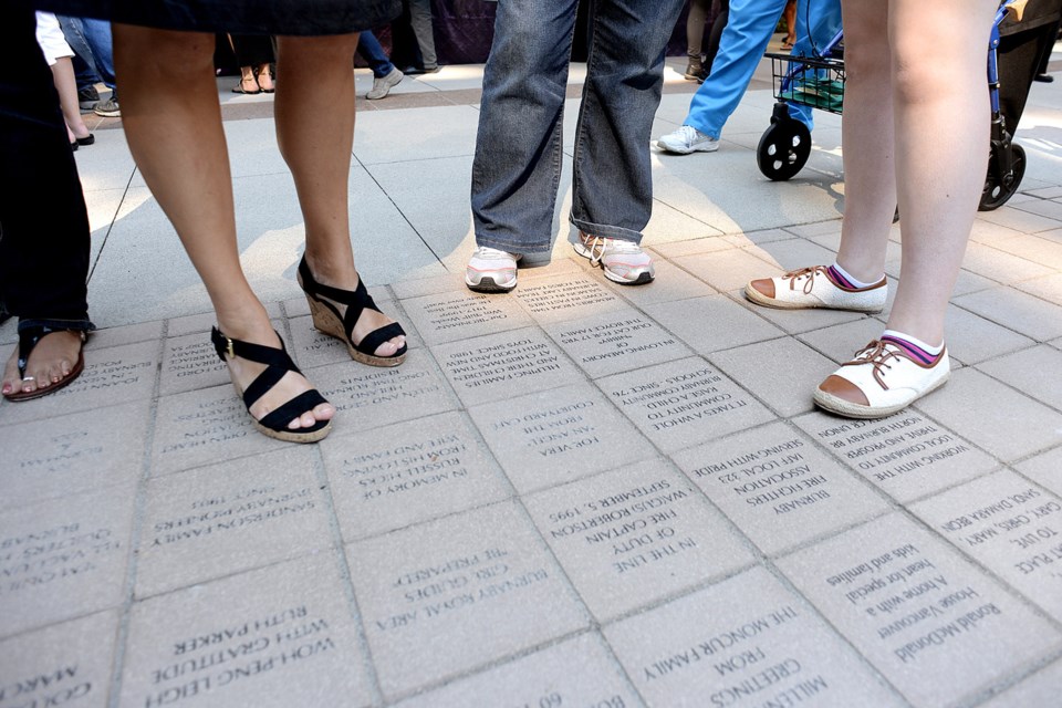 New pavers were dedicated in the Citizens' Plaza at Burnaby City Hall during the city hall open house on Saturday.