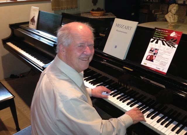 Winfried Rompf, 73, plays one of the three pianos in his basement, where he bases his full-time piano-teaching business, amongst his other affairs.