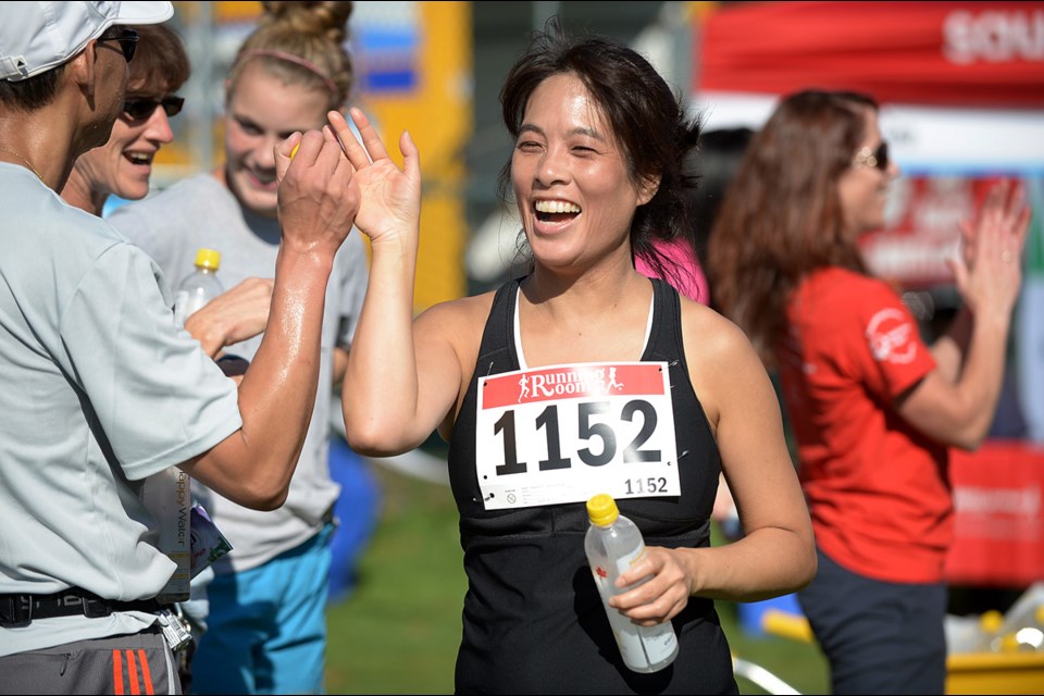 Candice Mah finishes the five-kilometre stretch at the Rhythm of Life Walk/Run, a fundraiser for Burnaby Hospital's healthy heart programs.
