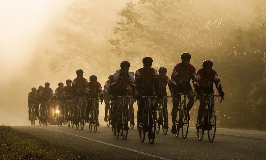 Tour de Rock team rides through fog shortly before several cyclists crashed. Sept. 28, 2014