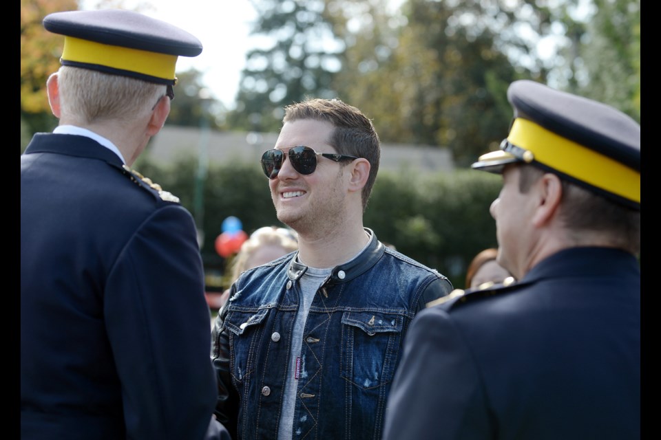Michael Bublé meets with Burnaby RCMP Chief Supt. Dave Critchley at the local detachment’s open house on Saturday.