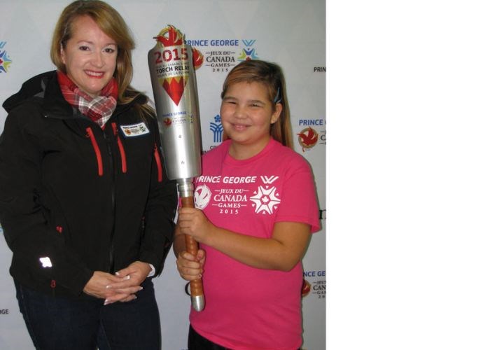 mayor-passes-torch-to-kid.0.jpg