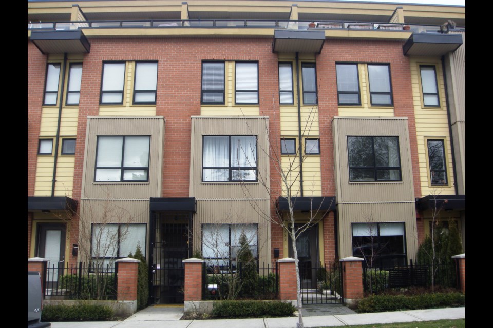 4 level stacked townhouses like this Vancouver development often have a higher density than some highrises. Photo Michael Geller