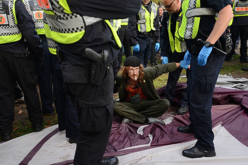 Vancouver police arrested campers Thursday at Oppenheimer Park. Photo Dan Toulgoet