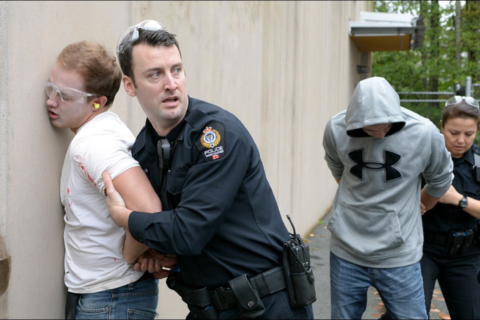 Police trainees from across the Lower Mainland participated in two, 90-minute simulations at the Justice Institute in New Westminster. Participants, who also included nursing students, UBC medical residents and paramedic students from the Justice Institute, had to work as a team during the simulated shooting incident to stop the “shooters” and care for casualties.