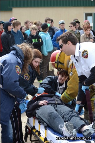 The SADD chapter at the Lampman School and EMS and fire personnel from the community joined forces to host a mock accident to show the effects of drinking and driving. The realistic exercise included four students who were injured in a drunk driving incident.