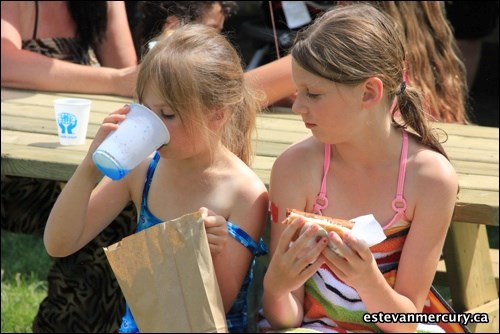 The sun was out and temperatures rose on Canada Day, so the most popular spot at the Kinsmen festivities at Hillside Park was near the water and slip and slide. That area offered the best chance to cool off after getting a bite and a balloon.