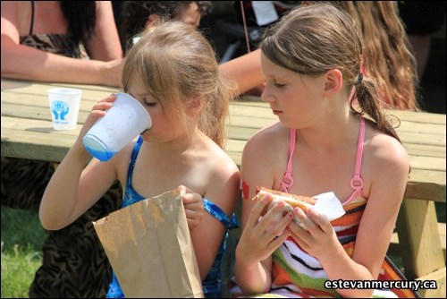 The sun was out and temperatures rose on Canada Day, so the most popular spot at the Kinsmen festivities at Hillside Park was near the water and slip and slide. That area offered the best chance to cool off after getting a bite and a balloon.