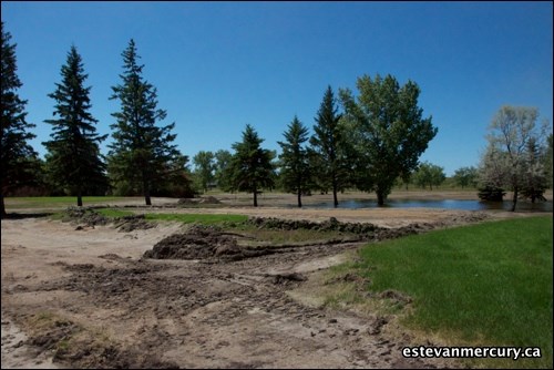 Flood waters left a disaster zone in their wake at Estevan Woodlawn Golf Club, washing many of the greens and fairways away and replacing them with layers of silt.