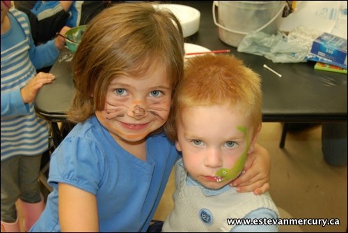 Kruz Shauf and Hailey Yaremko show off the specially designed face painting styles they received at the Heritage Days celebration at the EAGM last Friday.