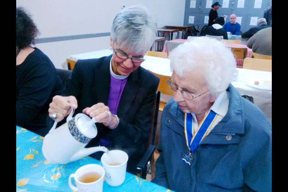 Bishop Melissa Skelton, left, pours tea for Peggy Quick, a longtime parishioner at St. Barnabas Church and a recipient of the Order of New Westminster, an honour given to Anglicans who have given greatly to their church. The bishop recently dropped by the local church for a visit.
