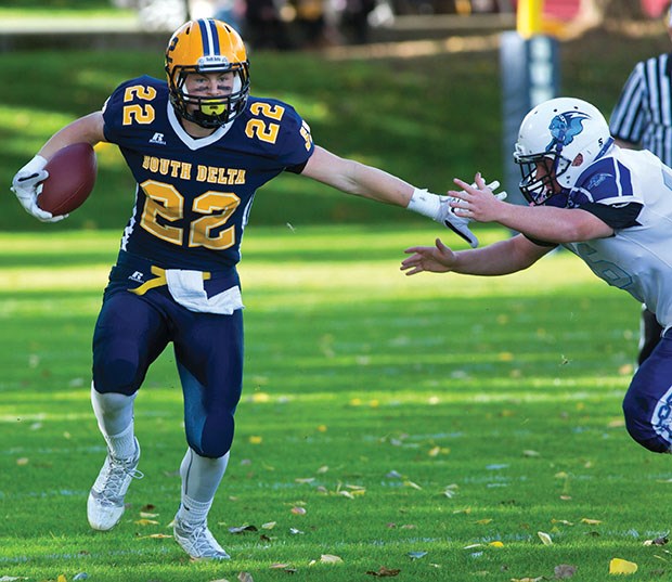 South Delta Sun Devils running back Grant McDonald heads up field during Saturday’s 43-14 win over the Belmont Bulldogs in B.C. High School Football Western Conference AAA action at Dennison Park. The result improved South Delta’s league record to 5-0-0.