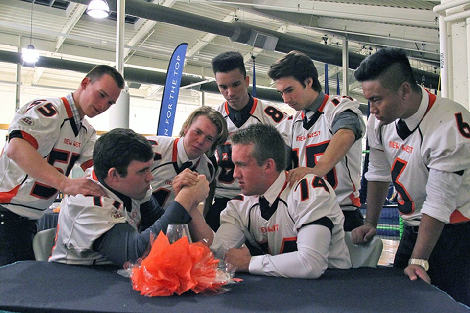 The Hyacks Varsity Arm Wrestling Team didn’t mind twisting a few arms to raise money for a good cause. The eight football players were part of a team-effort that helped raise over $20,000 for NWSS Hyack Football and the Royal City Hyack Football Club.