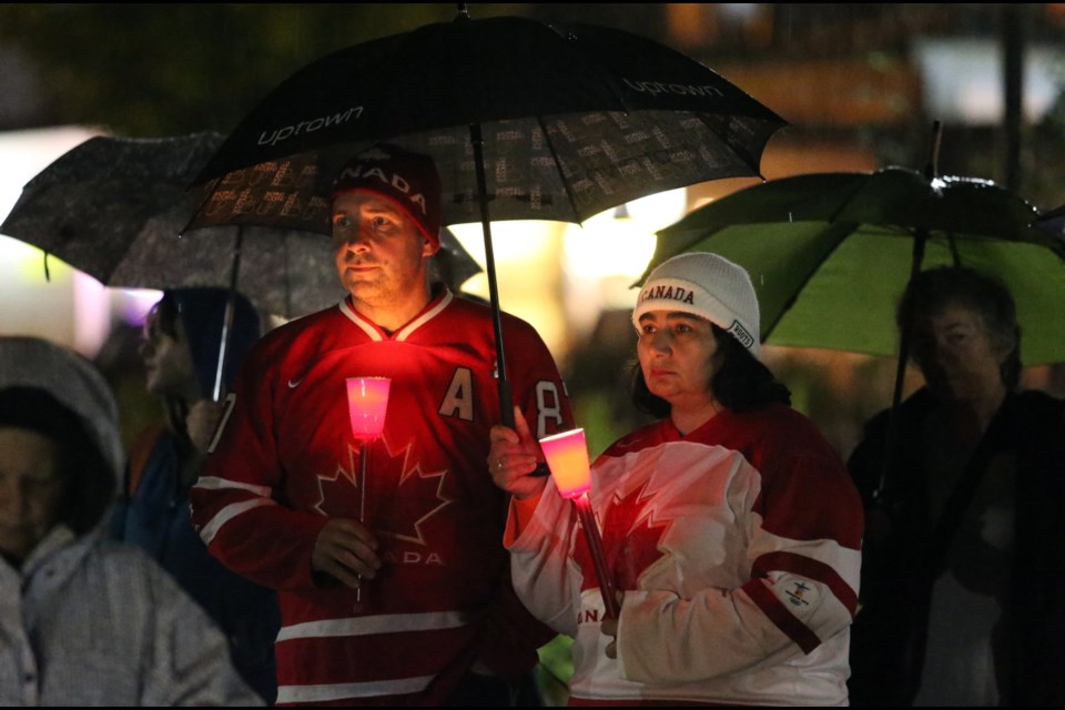 Dozens braved the rain at the cenotaph at Memorial Park on Esquimalt Road to attend the vigil.