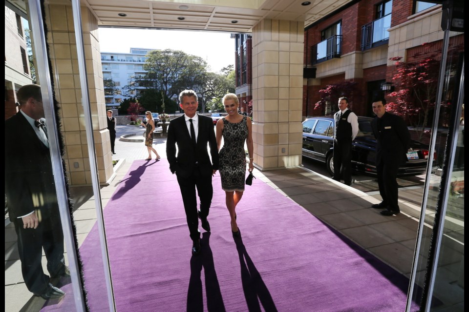 David Foster and his wife Yolanda walk in for the opening of the David Foster Foundation Theatre at the Oak Bay Beach Hotel.