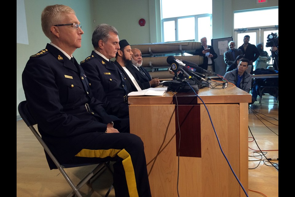 From left, Burnaby RCMP Chief Supt. Dave Critchley, Assistant Commissioner Wayne Rideout from RCMP's E Division, and representatives from the B.C. Muslim Association address media on Friday at the Burnaby mosque.