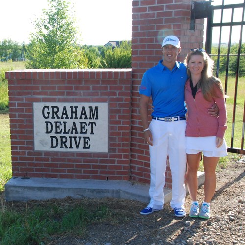 Graham DeLaet posed with his wife Ruby oat the gates of "Graham DeLaet Drive" on the way to the Weyburn Golf Club.