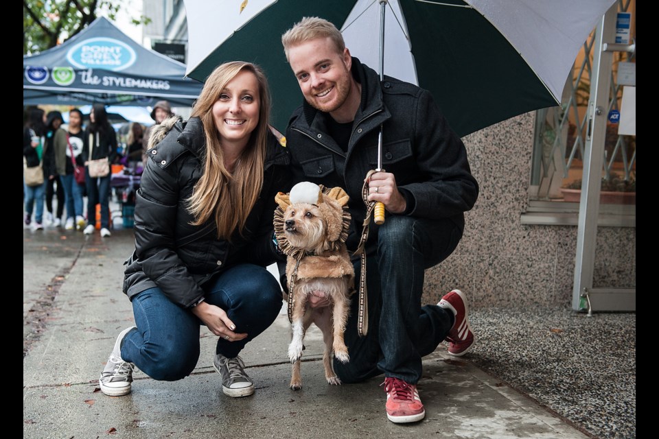 Mandie and Chris Hahm pause for a break in Riley’s trick or treating this past Saturday during the Point Grey Howl. Photograph by: Rebecca Blissett