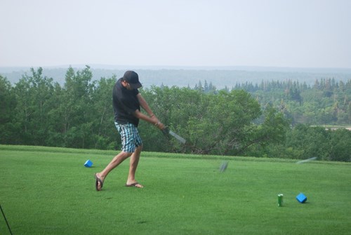 Rhett Parks tees off during at Golf Kenosee on July 13.