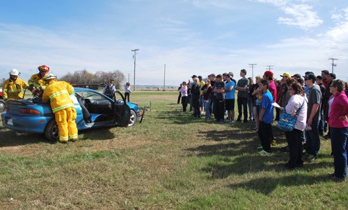 Those involved with the day looked on as firefighters used the Jaws of Life to rescue the backseat passenger.