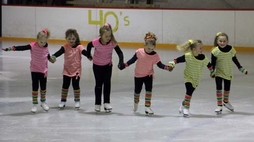 Nevaeh Armstrong, Macey Hall, Kate Hansen, Aurora Husband, Morgan Debenham, and Ashlyn Dovell take on the 1980s complete with big hair and bright clothes.