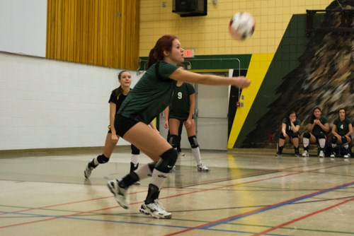 Kayla N. passes a perfect &#8220;up&#8221; to her setter during a heated match between Carlyle and  Kipling.