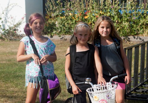Tarris, Ashley, and Tyra are quite happy to be back in school with all of their friends.